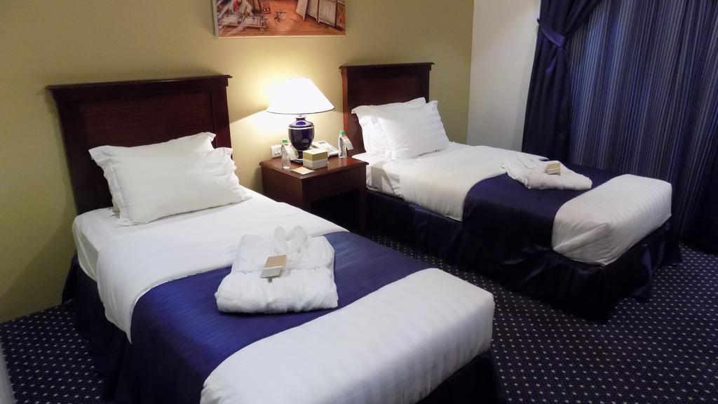 Onizah Hotel Unaizah Zimmer foto